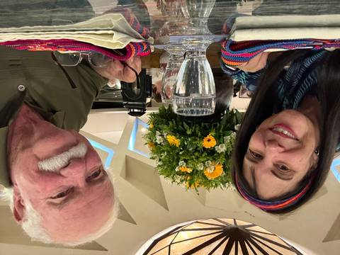 Couple dining indoors at a restaurant.