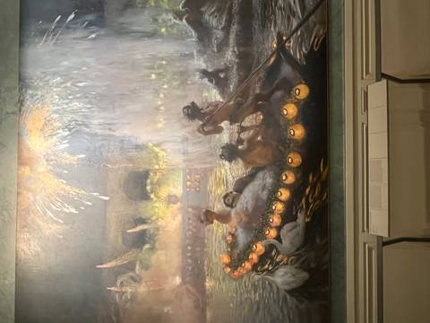 Large painting of a gondola in a museum.