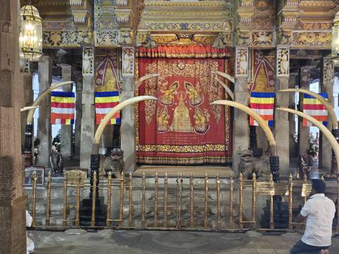       Interior of a temple with decorative elements.
  