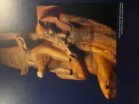       Close-up of an ancient Egyptian sculpture.
  