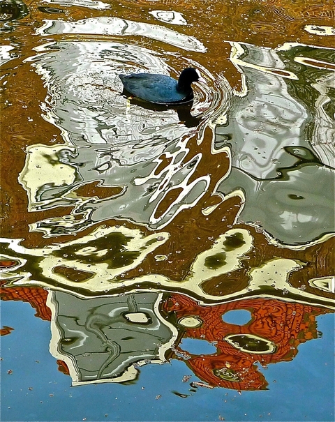 Abstract reflection on water surface.
