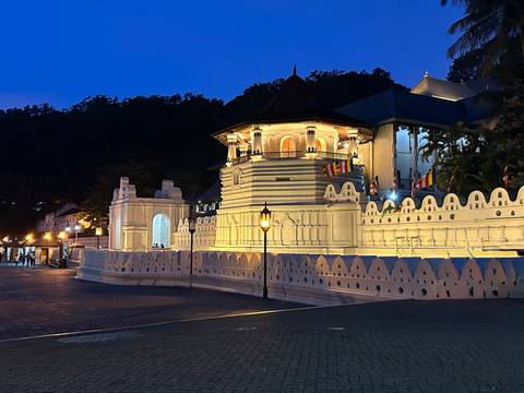       Temple of the Tooth in Kandy beautifully lit after dark.
  