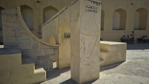       Stone and sundial structures inside Jantar Mantar astronomical observatory in Jaipur.
  