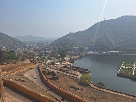       View from Amber Fort ramparts over Maota Lake and surrounding Jaipur hills
  