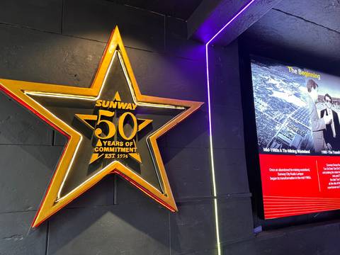       Indoor display featuring a golden star celebrating Sunway's 50 years of commitment.
  