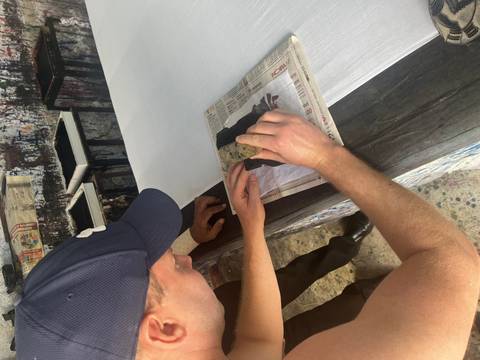       Visitor learns traditional block printing on fabric using wooden stamps and ink.
  