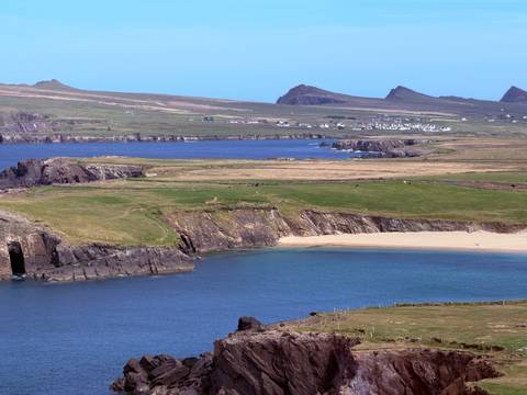       Turquoise bay, sandy beach and rugged headlands along the scenic Slea Head coastline.
  