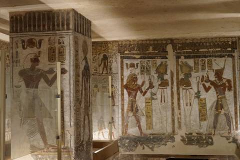       Colorful, well-preserved wall paintings and hieroglyphs inside an ancient Egyptian tomb.
  