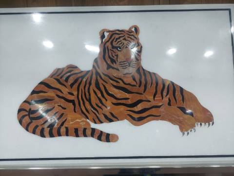       Flat art depiction of a reclining tiger against a white background under bright lights
  