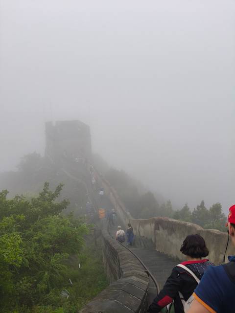       Section of Great Wall barely visible through dense fog
  