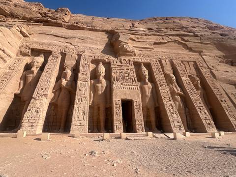       The rock-cut Temple of Nefertari at Abu Simbel features colossal standing figures and intricate carvings.
  