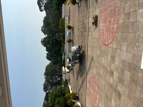       Historic military helicopter parked on the rooftop helipad of Ho Chi Minh City’s Reunification Palace.
  