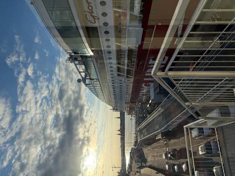       Viking Line cruise ship docked at terminal with sunrise light over Stockholm harbour
  