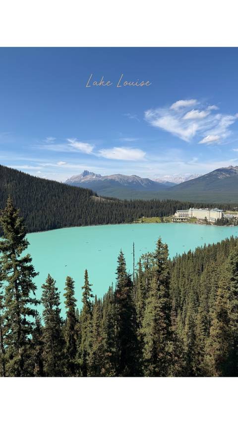       Turquoise Lake Louise with forested shores, chateau hotel and Rocky Mountain peaks.
  