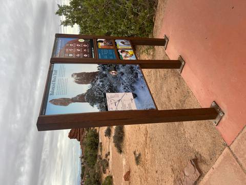       Trailhead information panel and area map for Balanced Rock Trail in a desert park
  