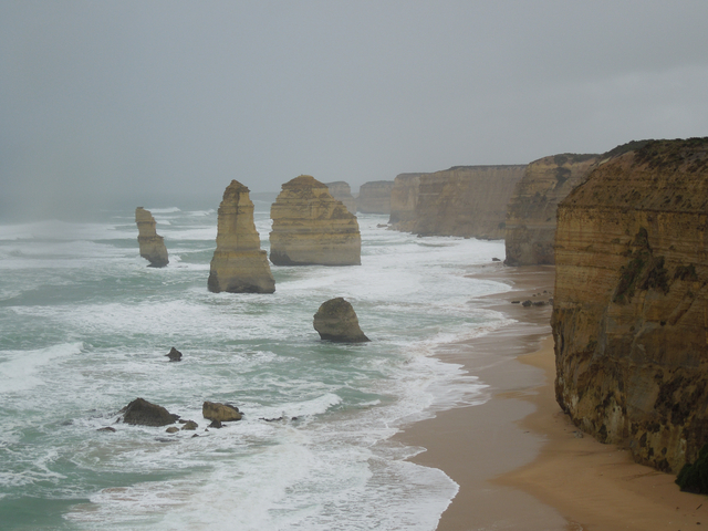       The Twelve Apostles rock formations along the coastline.
  