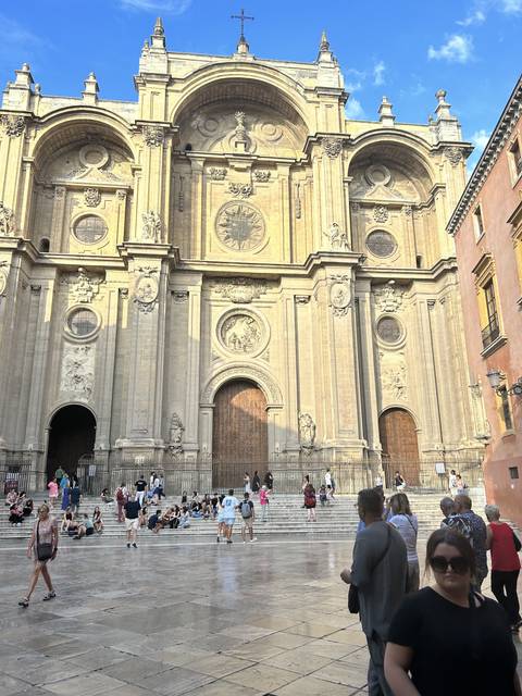 Facade of a grand building with intricate details.