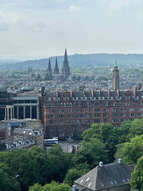       Tilted view of a cityscape with historical architecture.
  
