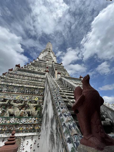 Close-up view of a temple's ornate stone carvings.
