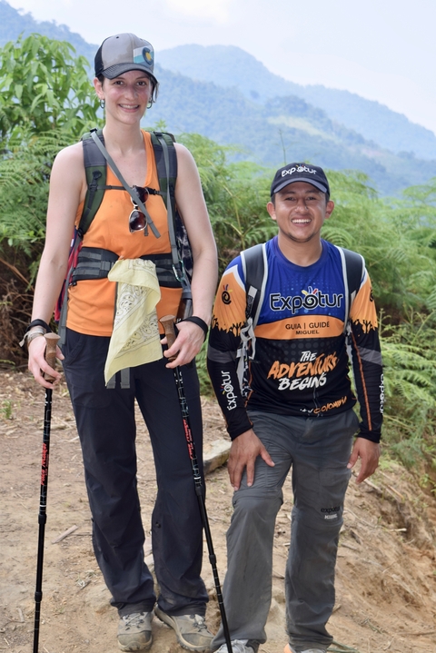       Close-up of hikers preparing to continue their journey.
  