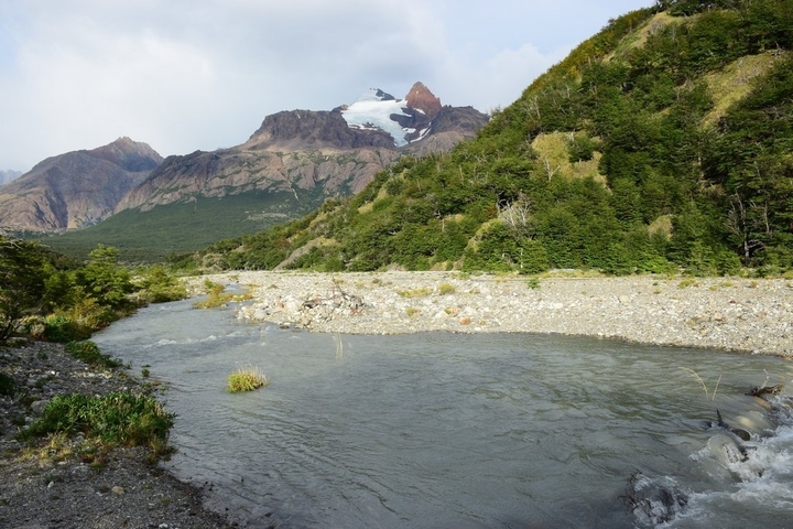 Mountain landscape with river winding through.