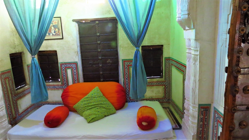 A decorative seating area with traditional decor.