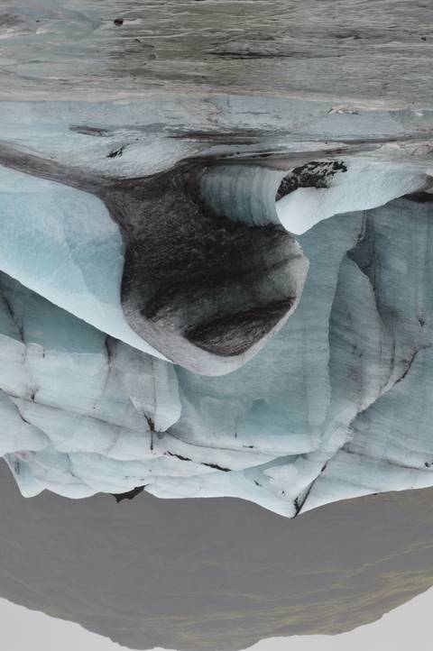       Ice formations with rocky landscape.
  