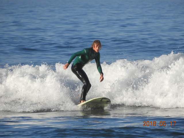 A person surfing on a wave.