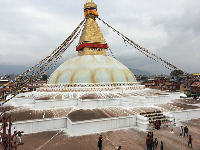 Boudhanath Stupa in Kathmandu with prayer flags.