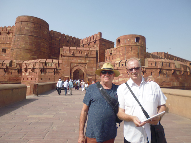 Two men in front of Agra Fort.