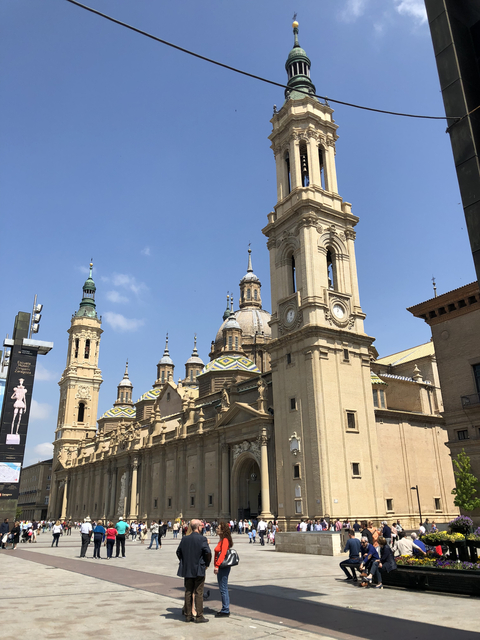 Historic cathedral with ornate architecture against a clear sky.