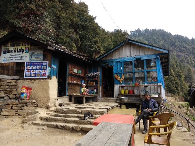 A rustic hotel and lodge in a mountainous area.
