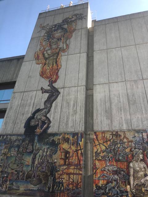       Large mural on a building wall
  