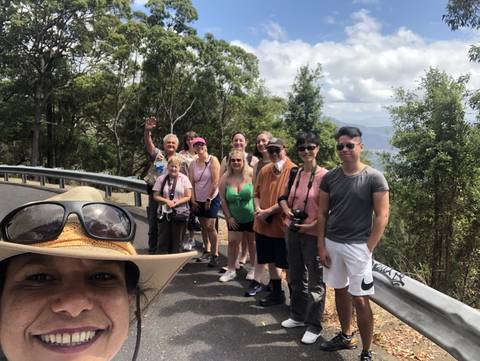 Group photo with trees in the background