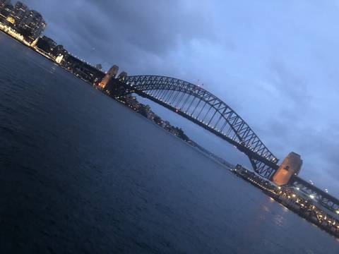       Harbour Bridge with Sydney cityscape at night
  