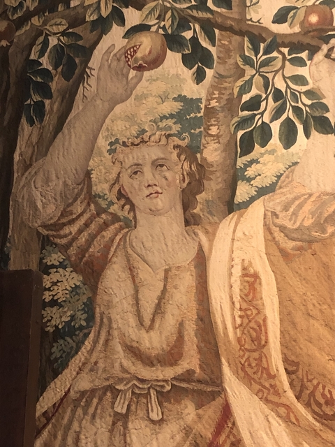       Textile artwork depicting a human figure.
  