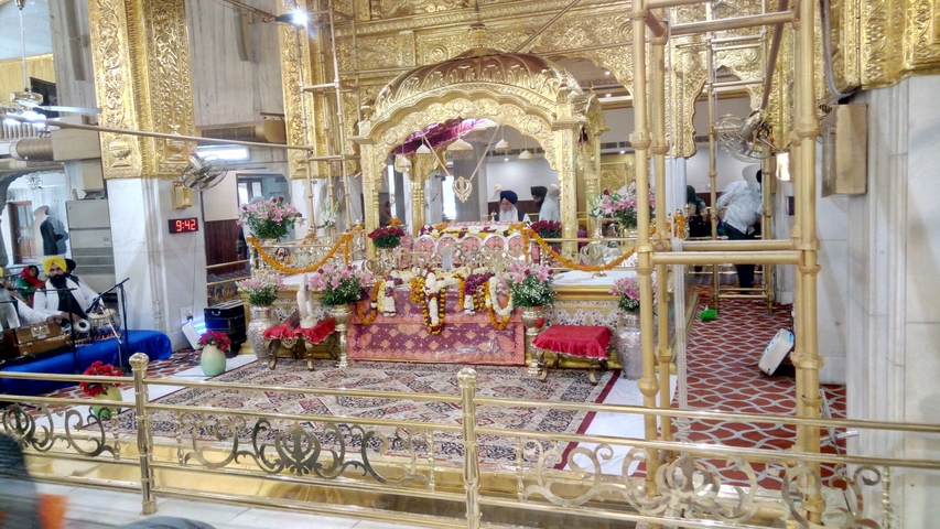 Ornate gold decoration in a sacred setting.