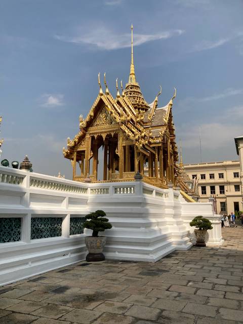 A traditional Thai temple with ornate architecture.