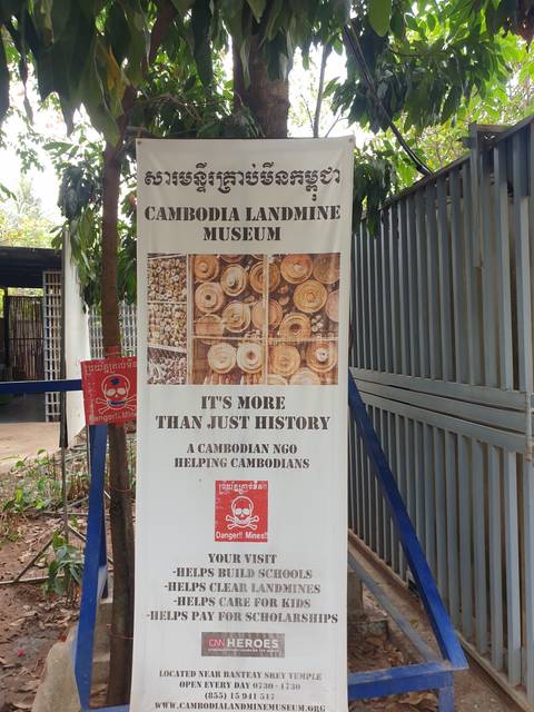       Poster with text and images about Cambodia
  
