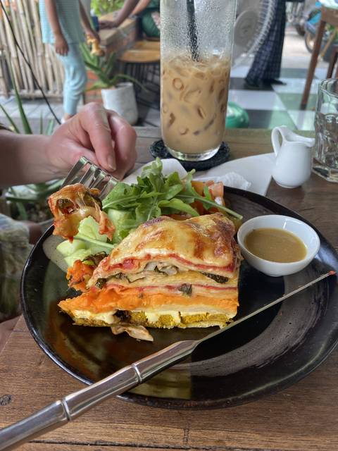       A meal with a drink on a table.
  