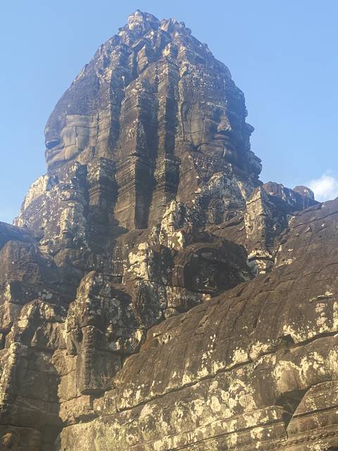 Close-up view of an ancient stone carving on a temple.