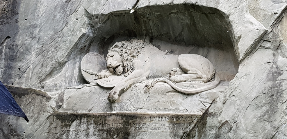 Famous carved lion monument in the rock.