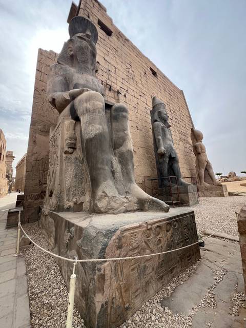       Tilted image of statues in an ancient temple.
  