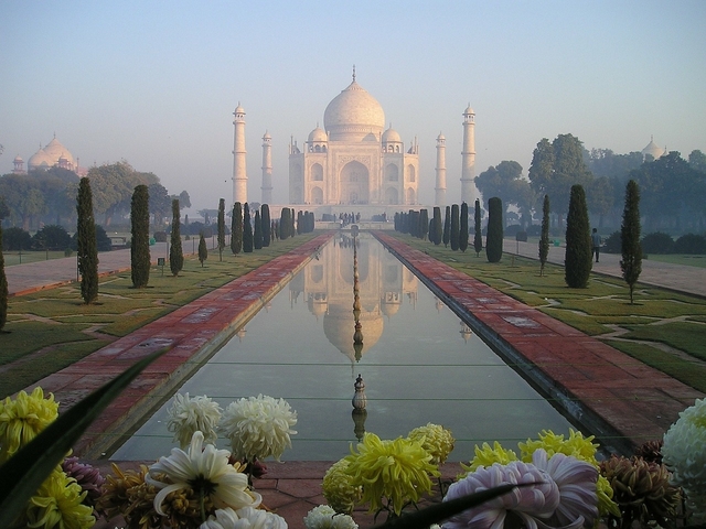 Taj Mahal with gardens and reflecting pool.