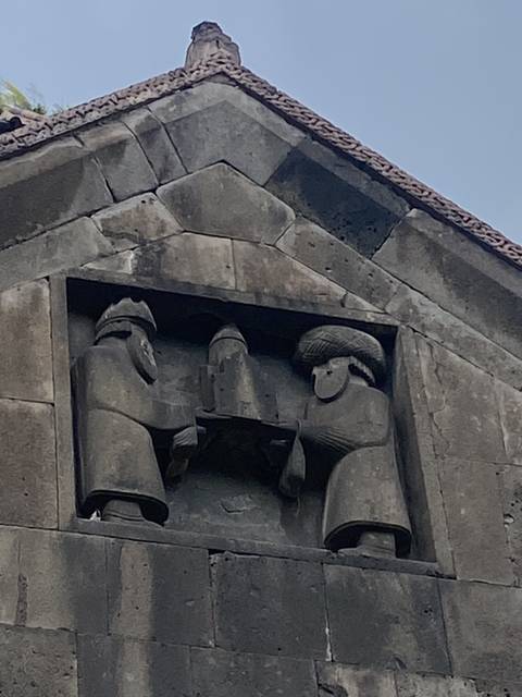       Close-up of architectural details on an old building.
  