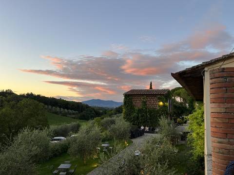       Sunset view with scattered pink clouds.
  