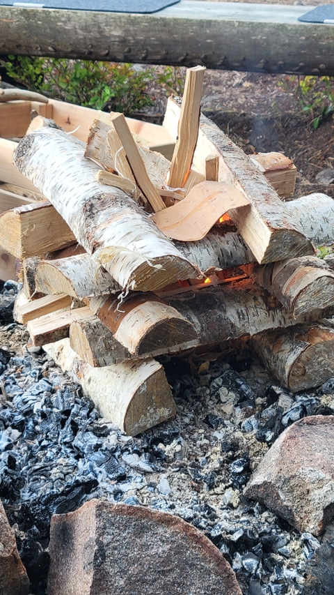       Stack of firewood ready to burn.
  