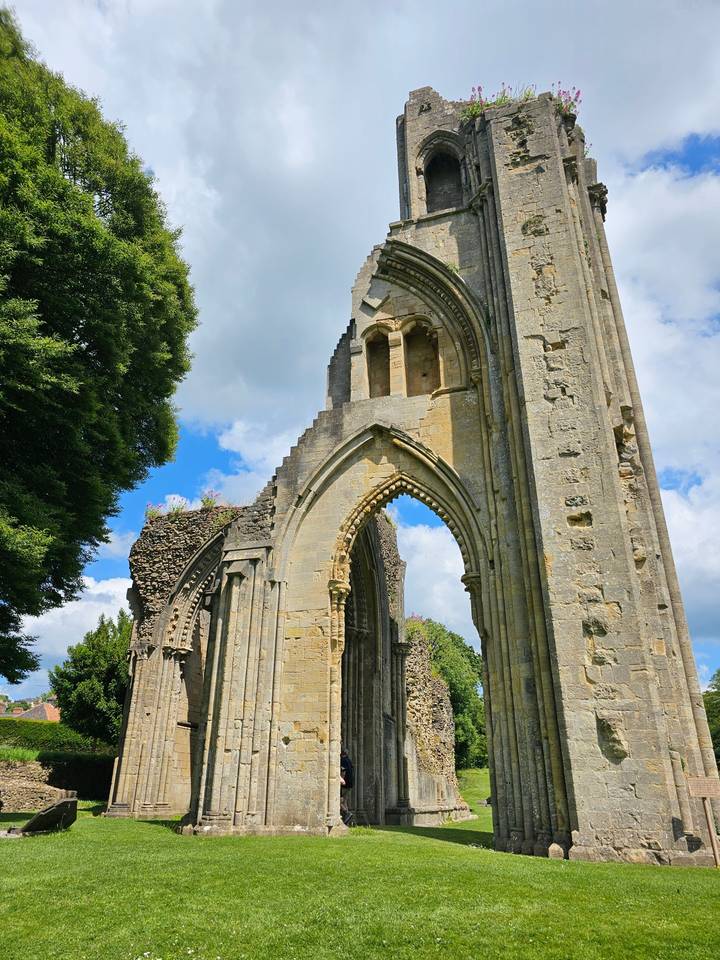 Ancient stone ruins with a blue sky background.