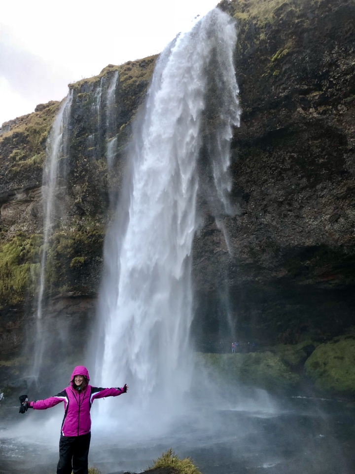 Partial view of a powerful waterfall descending over cliffs.