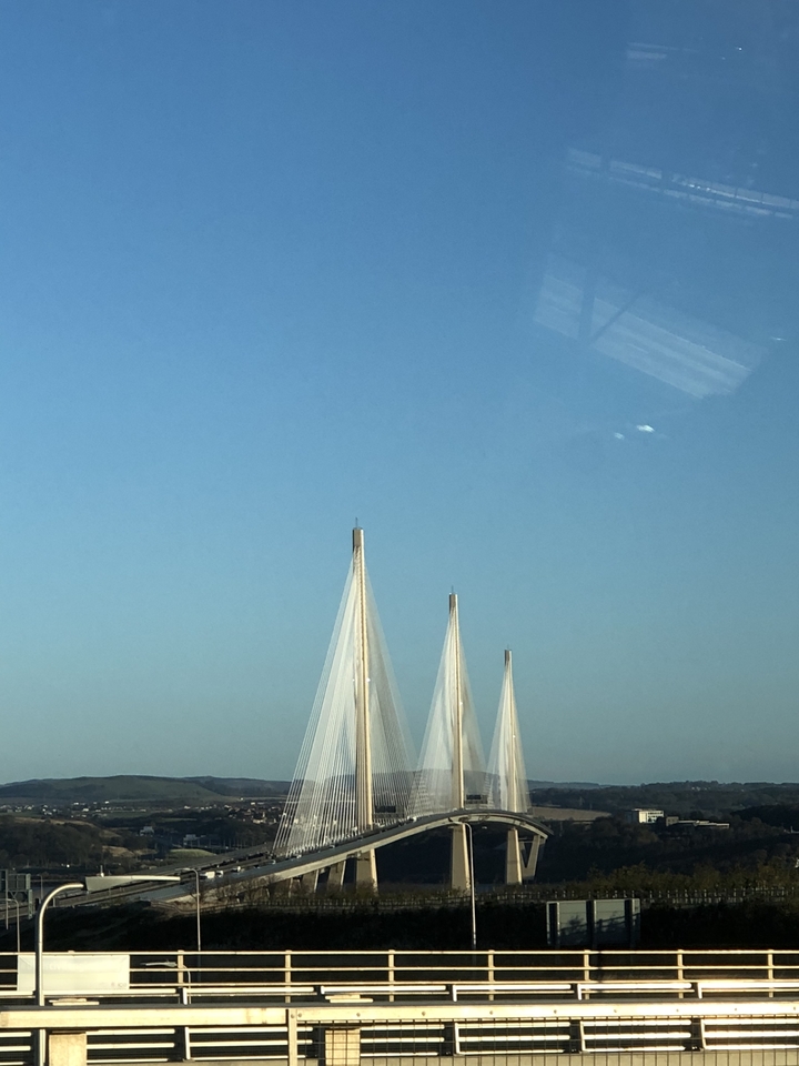 Cables of a suspension bridge against clear sky.